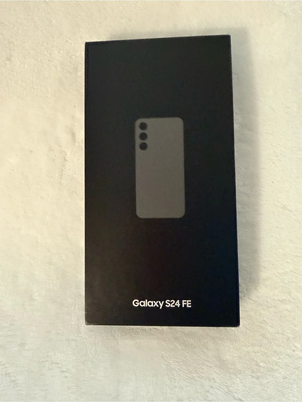 Samsung Galaxy S24 FE Smartphone in Graphite Gray with Triple Rear Cameras